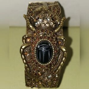 HEIDI DAUS - Bronze Crystal Cladded Hinged Cuff with Black Cabochon Beetle